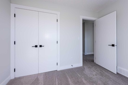 22 Cimarron Estates Gate, Okotoks, AB - Indoor Photo Showing Other Room