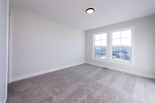 22 Cimarron Estates Gate, Okotoks, AB - Indoor Photo Showing Other Room