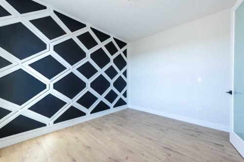 22 Cimarron Estates Gate, Okotoks, AB - Indoor Photo Showing Other Room