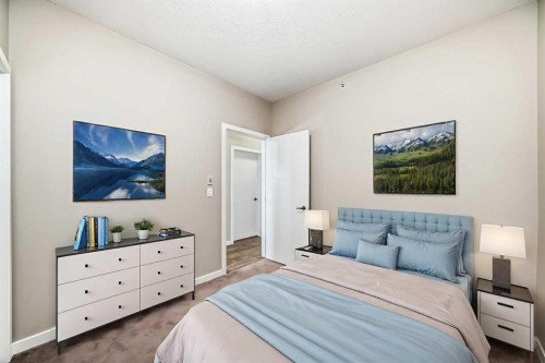 415-402 Marquis Lane Se, Calgary, AB - Indoor Photo Showing Bedroom
