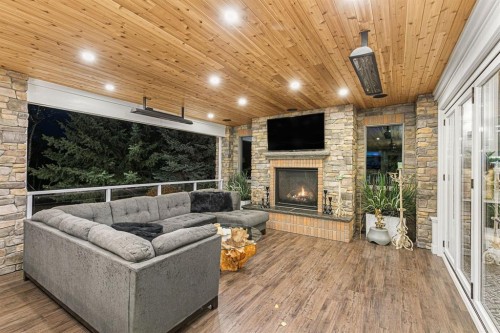 14 Pinehurst Drive, Heritage Pointe, AB - Indoor Photo Showing Living Room With Fireplace