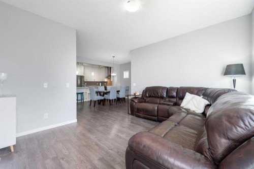 64 Copperpond Park Se, Calgary, AB - Indoor Photo Showing Living Room