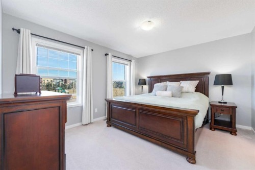 64 Copperpond Park Se, Calgary, AB - Indoor Photo Showing Bedroom