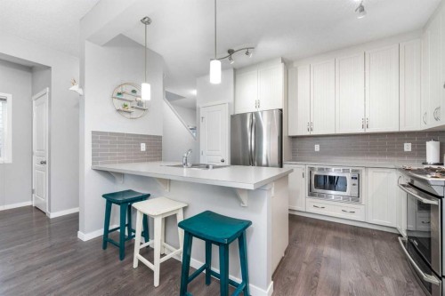 64 Copperpond Park Se, Calgary, AB - Indoor Photo Showing Kitchen With Stainless Steel Kitchen With Upgraded Kitchen