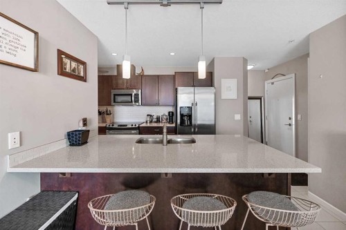1708-211 13 Avenue Se, Calgary, AB - Indoor Photo Showing Kitchen With Stainless Steel Kitchen With Double Sink With Upgraded Kitchen