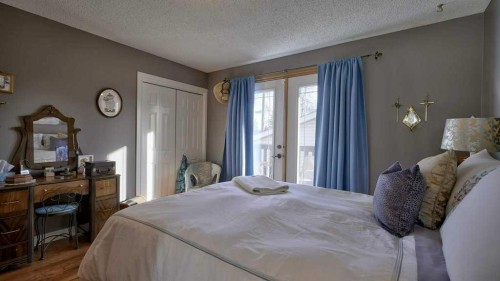 232 Penbrooke Way Se, Calgary, AB - Indoor Photo Showing Bedroom