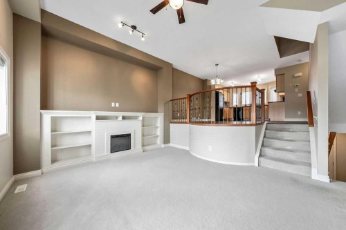 313 Strathcona Circle, Strathmore, AB - Indoor Photo Showing Other Room With Fireplace