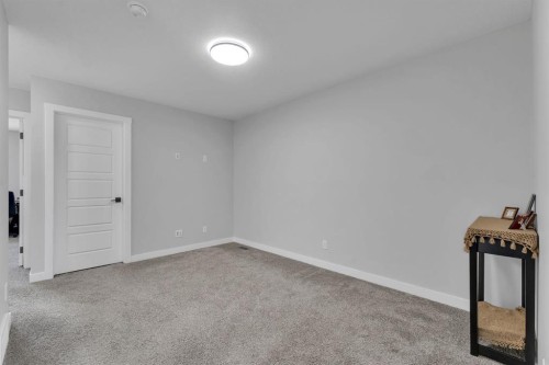 67 Corner Glen Gardens Ne, Calgary, AB - Indoor Photo Showing Other Room