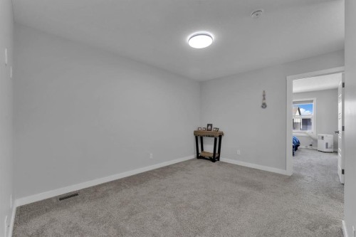 67 Corner Glen Gardens Ne, Calgary, AB - Indoor Photo Showing Other Room