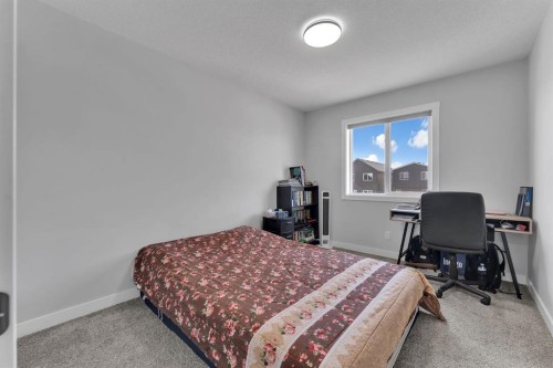 67 Corner Glen Gardens Ne, Calgary, AB - Indoor Photo Showing Bedroom