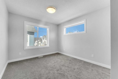 342 Canals Crossing Sw, Airdrie, AB - Indoor Photo Showing Other Room