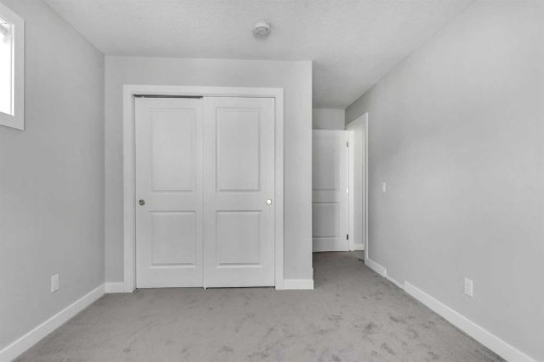 342 Canals Crossing Sw, Airdrie, AB - Indoor Photo Showing Other Room