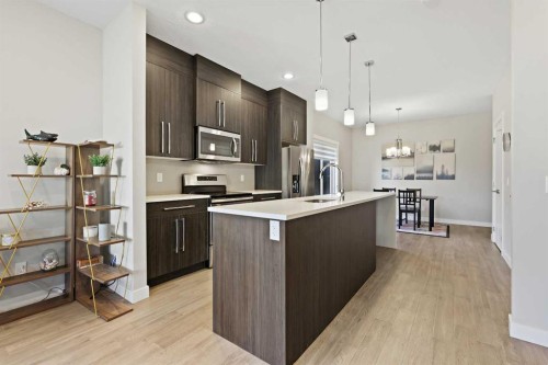 357 Sage Hill Circle Nw, Calgary, AB - Indoor Photo Showing Kitchen With Upgraded Kitchen