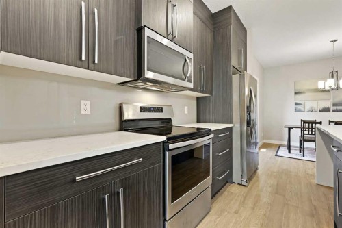 357 Sage Hill Circle Nw, Calgary, AB - Indoor Photo Showing Kitchen With Stainless Steel Kitchen With Upgraded Kitchen