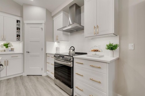 185 Riverwood Crescent, Diamond Valley, AB - Indoor Photo Showing Kitchen
