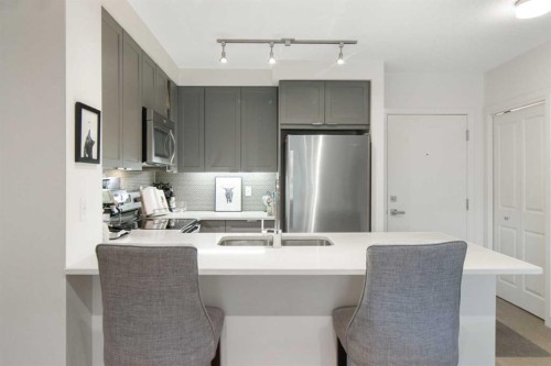 128-25 Auburn Meadows Avenue Se, Calgary, AB - Indoor Photo Showing Kitchen With Stainless Steel Kitchen With Double Sink With Upgraded Kitchen