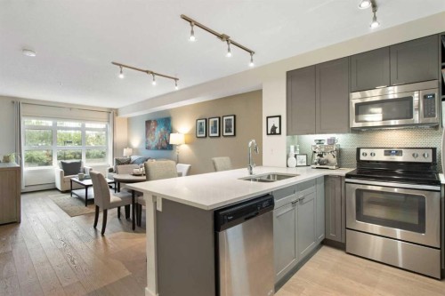 128-25 Auburn Meadows Avenue Se, Calgary, AB - Indoor Photo Showing Kitchen With Stainless Steel Kitchen With Double Sink