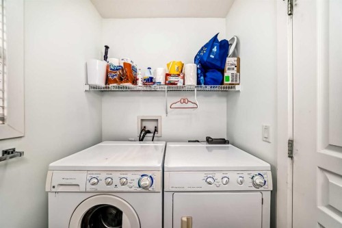 119 Panatella Hill Nw, Calgary, AB - Indoor Photo Showing Laundry Room