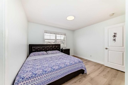 119 Panatella Hill Nw, Calgary, AB - Indoor Photo Showing Bedroom