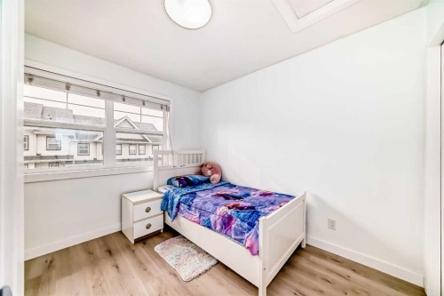 119 Panatella Hill Nw, Calgary, AB - Indoor Photo Showing Bedroom