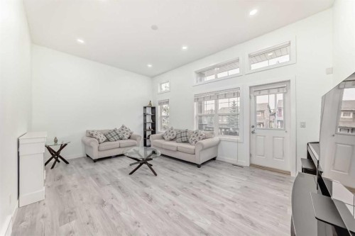 119 Panatella Hill Nw, Calgary, AB - Indoor Photo Showing Living Room