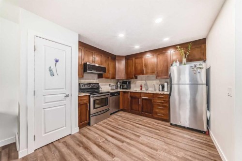 119 Panatella Hill Nw, Calgary, AB - Indoor Photo Showing Kitchen