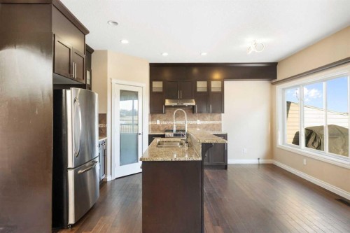 100 Lakeside View, Strathmore, AB - Indoor Photo Showing Kitchen With Double Sink With Upgraded Kitchen