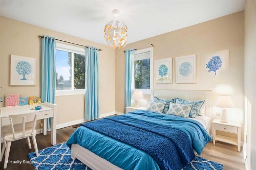 100 Lakeside View, Strathmore, AB - Indoor Photo Showing Bedroom