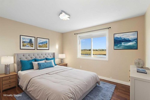 100 Lakeside View, Strathmore, AB - Indoor Photo Showing Bedroom