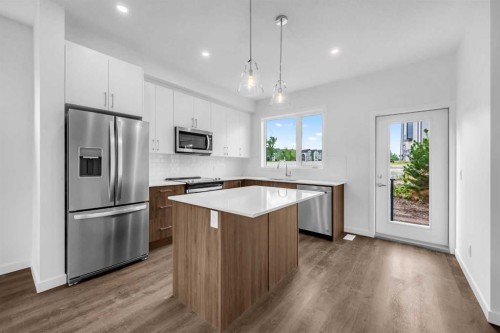 101-25 Evanscrest Mews Nw, Calgary, AB - Indoor Photo Showing Kitchen With Stainless Steel Kitchen With Upgraded Kitchen