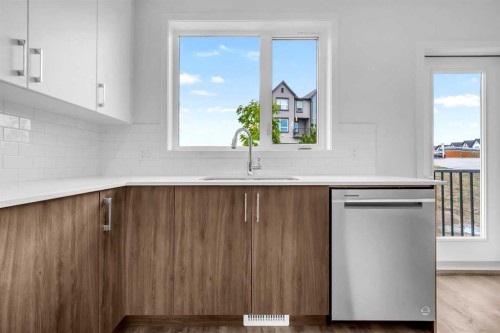 101-25 Evanscrest Mews Nw, Calgary, AB - Indoor Photo Showing Kitchen