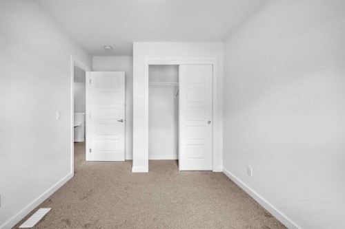 101-25 Evanscrest Mews Nw, Calgary, AB - Indoor Photo Showing Other Room