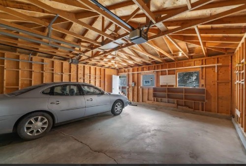5339 Brisebois Drive Nw, Calgary, AB - Indoor Photo Showing Garage