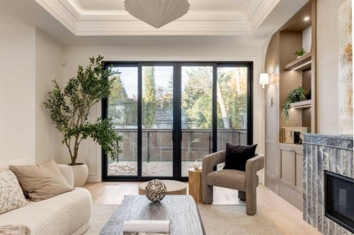 412 40 Avenue Sw, Calgary, AB - Indoor Photo Showing Other Room With Fireplace