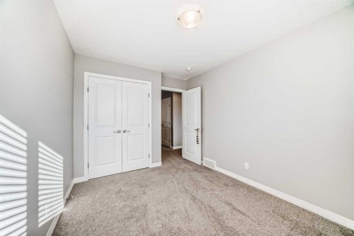 615 Kingsmere Way Se, Airdrie, AB - Indoor Photo Showing Other Room
