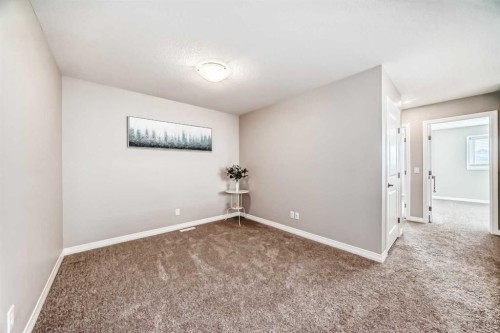 615 Kingsmere Way Se, Airdrie, AB - Indoor Photo Showing Other Room