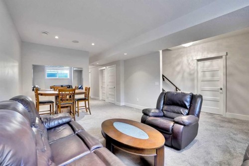 172 Kinniburgh Way, Chestermere, AB - Indoor Photo Showing Living Room