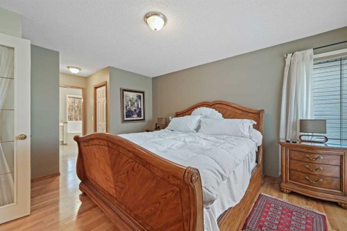 114 Valley Ponds Crescent Nw, Calgary, AB - Indoor Photo Showing Bedroom