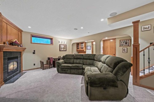 114 Valley Ponds Crescent Nw, Calgary, AB - Indoor Photo Showing Living Room With Fireplace