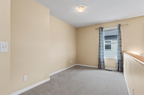 1043 Copperfield Boulevard Se, Calgary, AB - Indoor Photo Showing Other Room