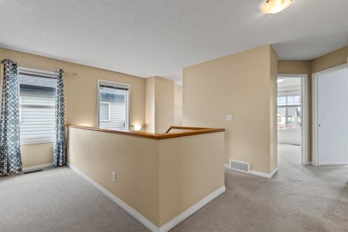 1043 Copperfield Boulevard Se, Calgary, AB - Indoor Photo Showing Other Room