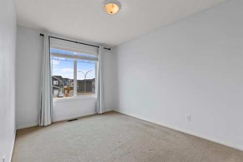 1043 Copperfield Boulevard Se, Calgary, AB - Indoor Photo Showing Other Room