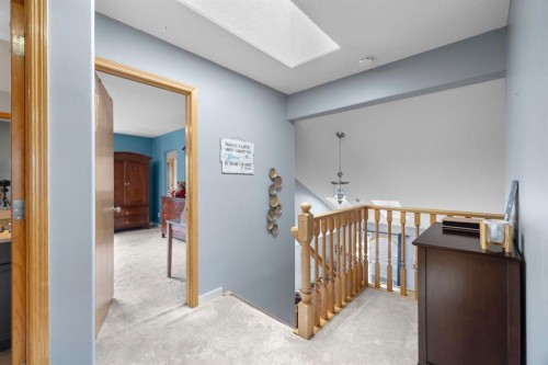 168 Fairways Drive Nw, Airdrie, AB - Indoor Photo Showing Other Room