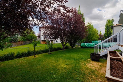 168 Fairways Drive Nw, Airdrie, AB - Outdoor With Backyard