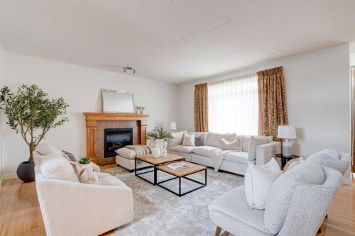 108 Tuscany Estates Close Nw, Calgary, AB - Indoor Photo Showing Living Room With Fireplace