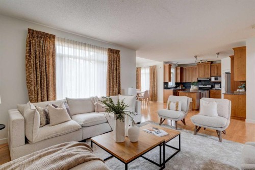 108 Tuscany Estates Close Nw, Calgary, AB - Indoor Photo Showing Living Room