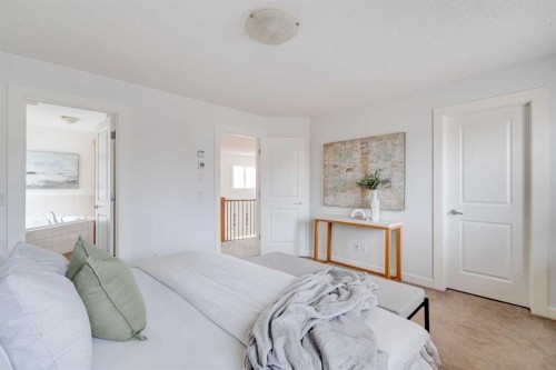 108 Tuscany Estates Close Nw, Calgary, AB - Indoor Photo Showing Bedroom
