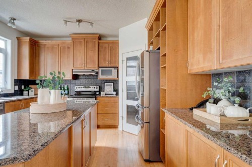 108 Tuscany Estates Close Nw, Calgary, AB - Indoor Photo Showing Kitchen With Upgraded Kitchen