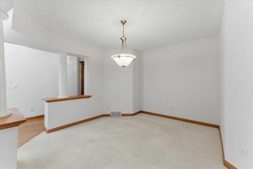 69 Scimitar Point Nw, Calgary, AB - Indoor Photo Showing Other Room