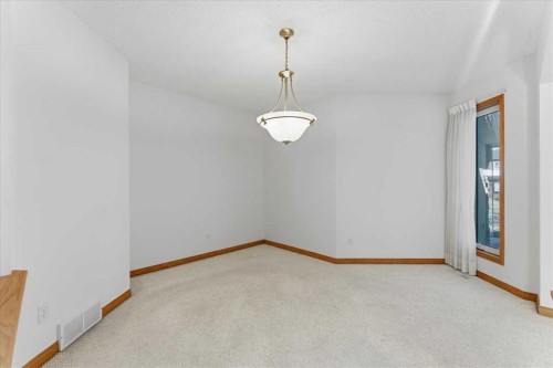 69 Scimitar Point Nw, Calgary, AB - Indoor Photo Showing Other Room